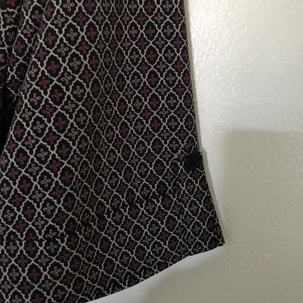 Nice work shirt. Pretty pattern with blacks/ purples. Never worn